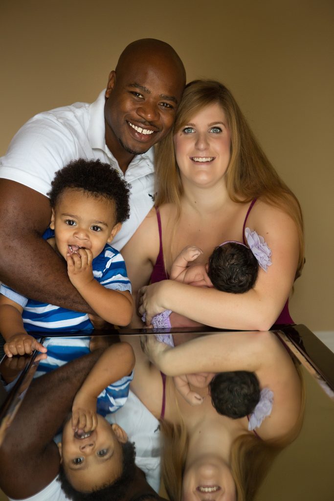 In house family pictures with newborn baby