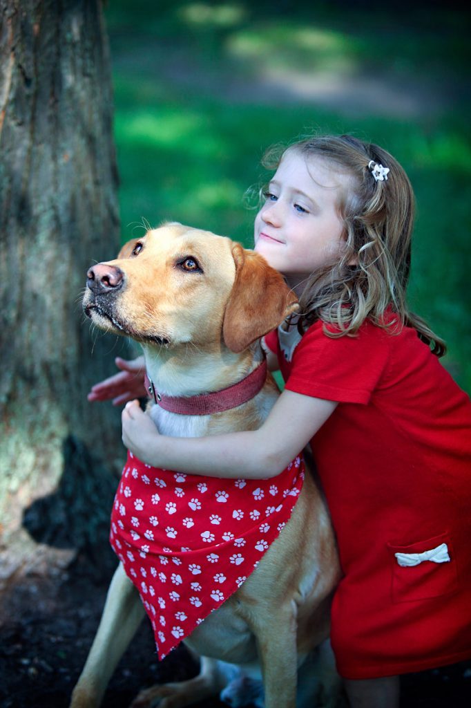 Little girl with her dog picture